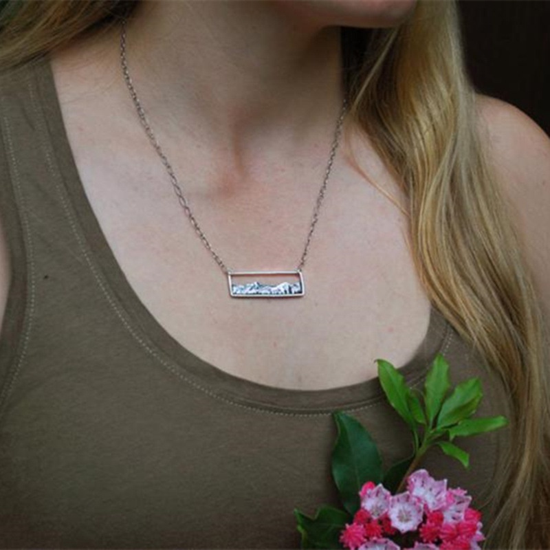 Collier avec pendentif en form - Travel Accessories Wholesale avis et prix